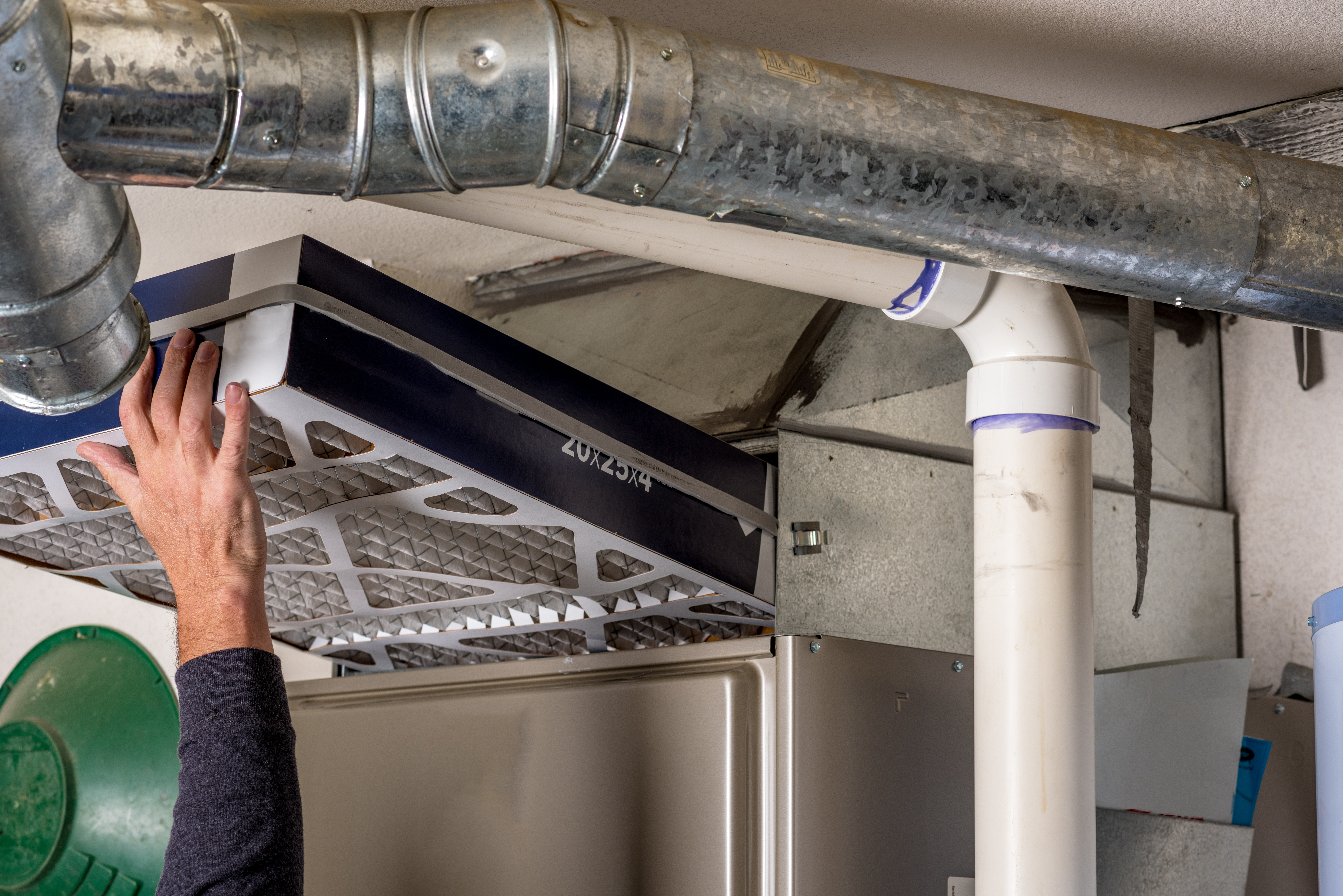 replacing furnace filter during tuneup